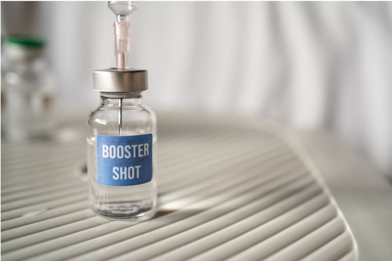 booster dose of a vaccine in vial 