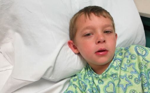 Severe Otalgia and Fever in a 6-year-old Boy 