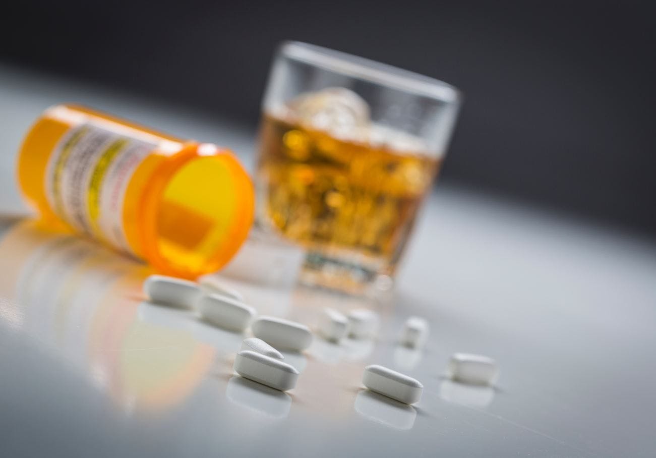 One in 5 US Adults Mixes Alcohol Use with Alcohol-Interactive Medications image credit booze and pills ©Andy Dean/stock.adobe.com