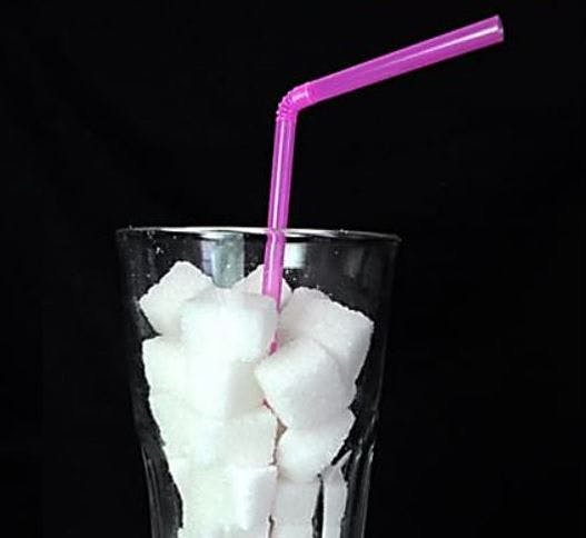 sugar cubes in a glass ©Zsido/Shutterstock