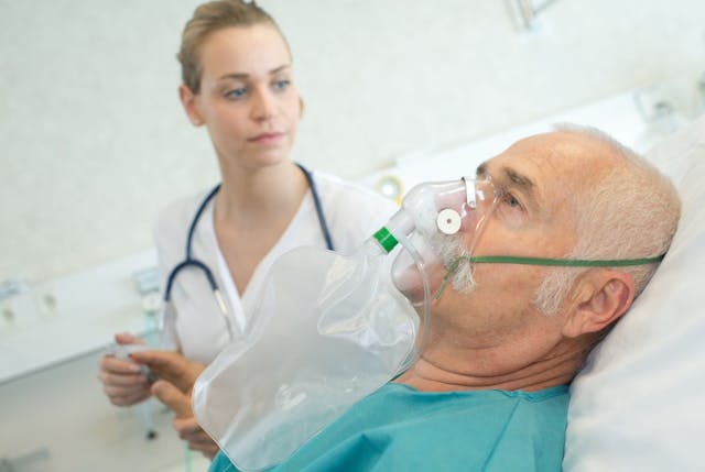 RSV Disease Severity Comparable to Unvaccinated COVID-19, Influenza: New Research / image credit older man in hospital ©auremar/stock.adobe.com
